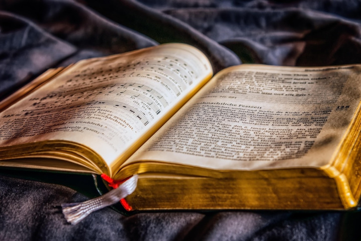 stack of books with bookmark